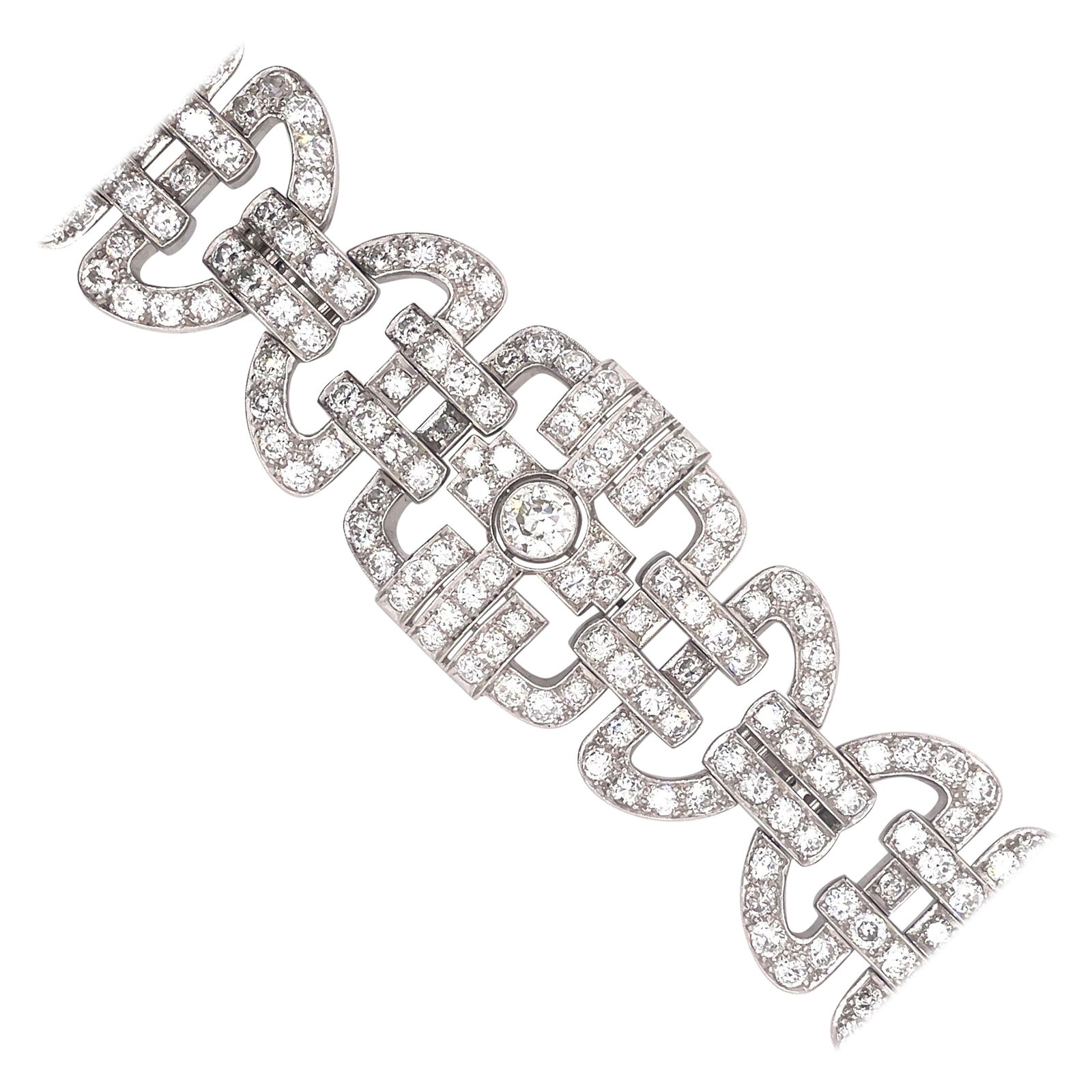 Stunning Art Deco 35ct Diamond Bracelet in Platinum: Stunning Art Deco 35ct Diamond Bracelet in Platinum This exquisite Art Deco style bracelet features approximately 35 carats of dazzling old mine cut and round brilliant diamonds, showcasing H/I color