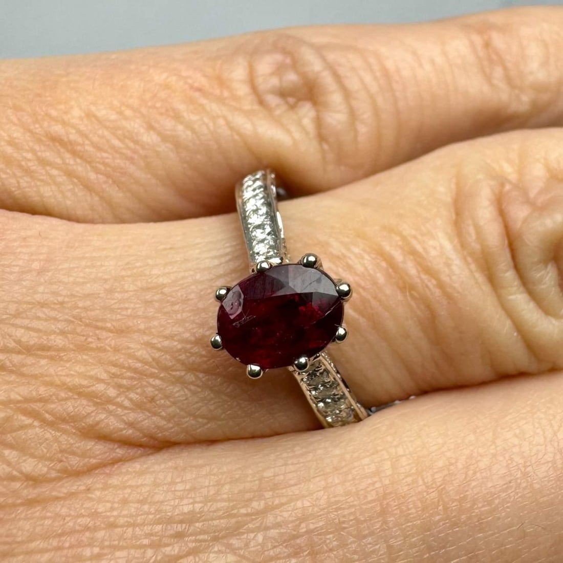 1.15 Ct Natural No Heat Ruby Engagement Ring with Diamonds in 14K White Gold: 1.15 Ct Natural No Heat Ruby Engagement Ring with Diamonds in 14K White Gold This stunning engagement ring features a natural 1.15 Ct ruby, known for its vibrant color and clarity, without any heat tr