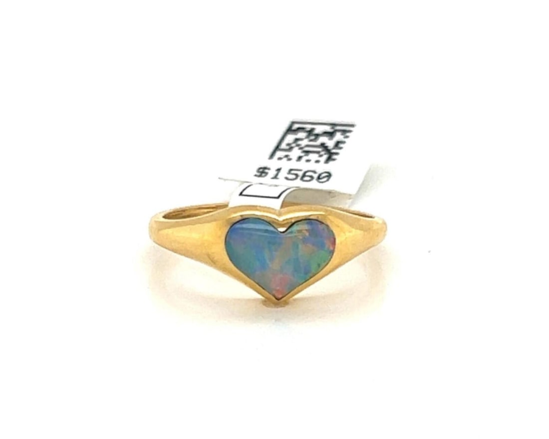 Kabana Fire Opal Mini Heart 14k Yellow Gold Ring Size 6.5: Kabana Fire Opal Mini Heart 14k Yellow Gold Ring Size 6.5 This Kabana ring features a mini heart design crafted from 14k yellow gold and set with a vibrant fire opal gemstone. The ring is signed by Ka