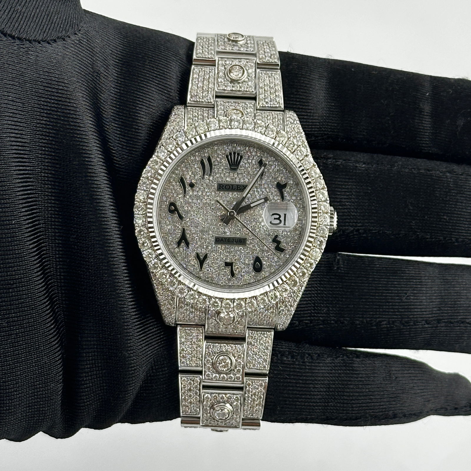 Rolex Datejust 126334 Diamond Arabic Dial Men's Watch with Solitaire Oyster Bracelet: Rolex Datejust 126334 Diamond Arabic Dial Men's Watch with Solitaire Oyster Bracelet This Rolex Datejust features an iced out Arabic dial and a prong diamond bezel, complemented by an iced out Oyster