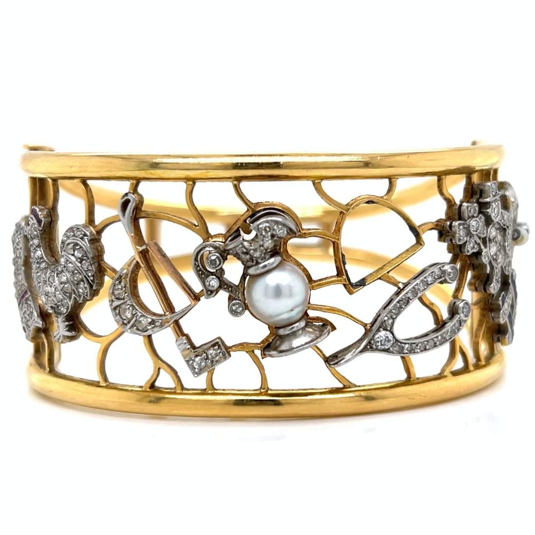 Luxurious 18K Yellow Gold Bangle with Platinum Diamond Charms: Luxurious 18K Yellow Gold Bangle with Platinum Diamond Charms This stunning 18K yellow gold bangle features exquisite platinum diamond charms, making it a luxurious addition to any jewelry collection.