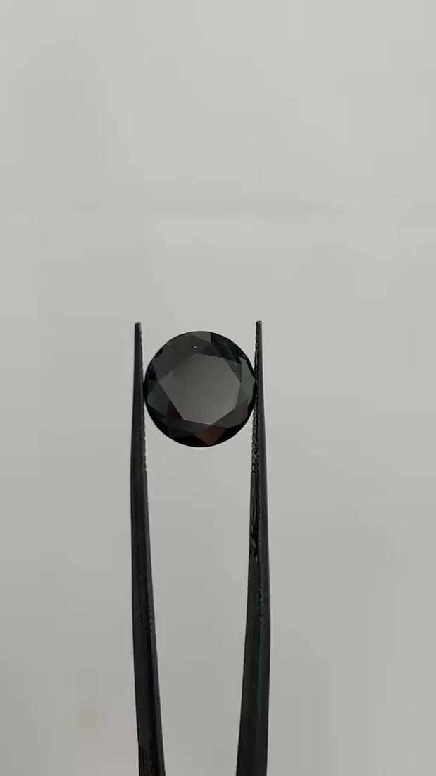 Loose Diamond - ROUND 7.12ct Fancy Black VVS2: Loose Diamond - ROUND 7.12ct Fancy Black VVS2 Source: Natural Shape: ROUND Carats: 7.12 Color: Fancy Black Certification: GIA Video: