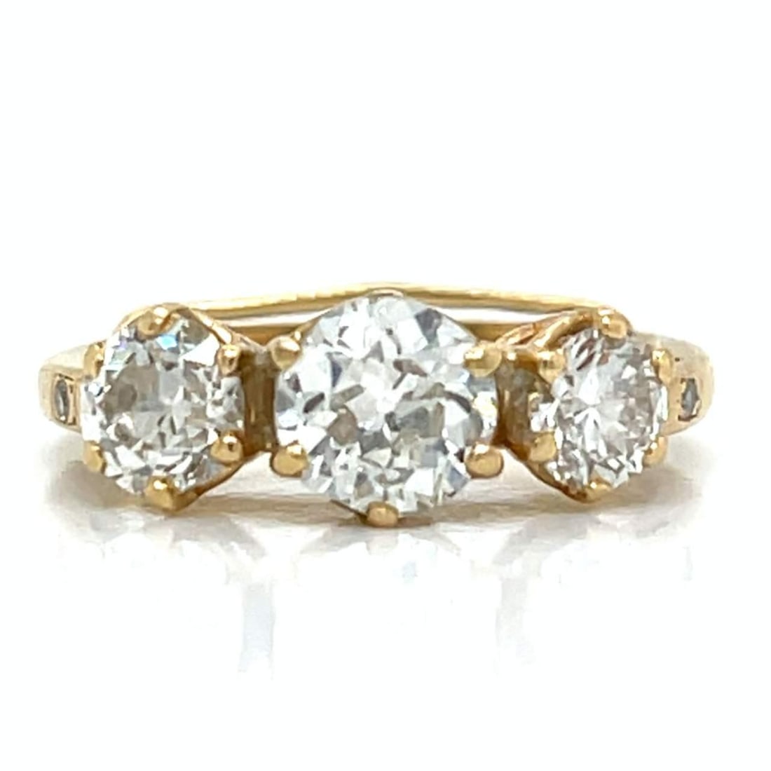 14K Yellow Gold 3 Stone European-Cut Diamond Ring G-H VVS-VS: 14K Yellow Gold 3 Stone European-Cut Diamond Ring G-H VVS-VS This exquisite 14K Yellow Gold 3 Stone Diamond Ring features a stunning design that showcases three European-cut diamonds. The centerpiece
