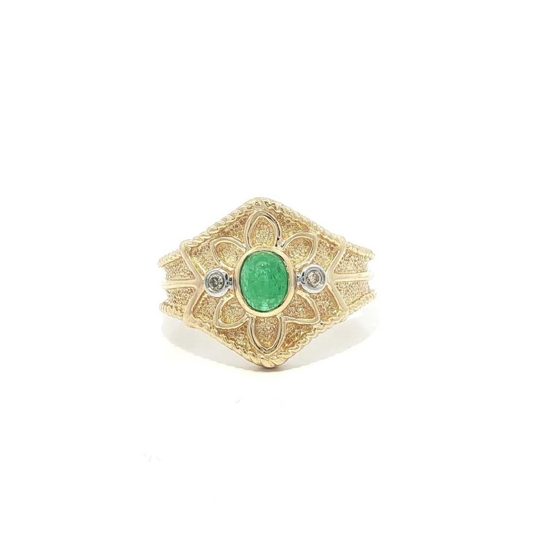 Floral Matte 14k Yellow Gold Ring With Cabochon Emerald and Diamond Accents: Floral Matte 14k Yellow Gold Ring With Cabochon Emerald and Diamond Accents This women's cocktail ring features an oval cabochon-cut natural emerald accented by two round brilliant-cut natural diamond