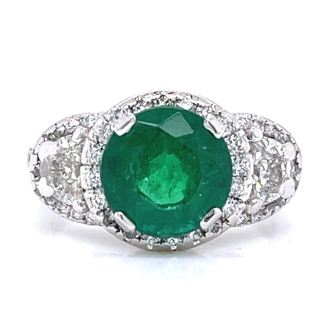 Platinum 2.49 Ct Emerald Diamond Ring with 54 Diamonds: Platinum 2.49 Ct Emerald Diamond Ring with 54 Diamonds This exquisite ring features a stunning 2.49 Ct. emerald at its center, elegantly complemented by a total of 54 diamonds. The diamonds consist of