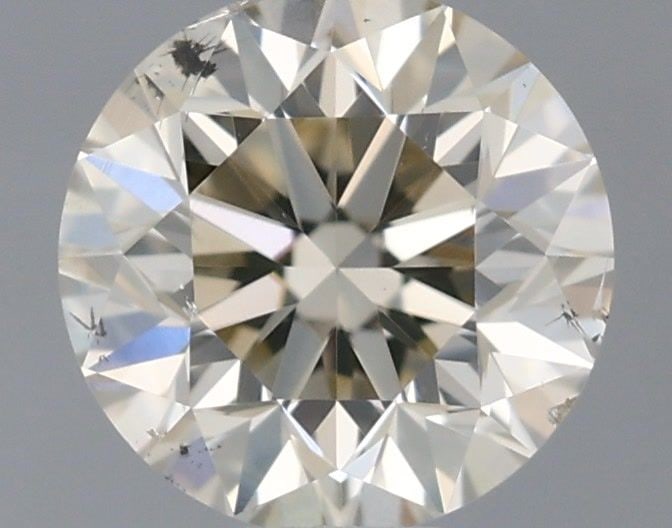 Loose Diamond - ROUND 0.4ct O-P SI1: Loose Diamond - ROUND 0.4ct O-P SI1 Source: Natural Shape: ROUND Carats: 0.4 Color: O-P Certification: GIA Video: