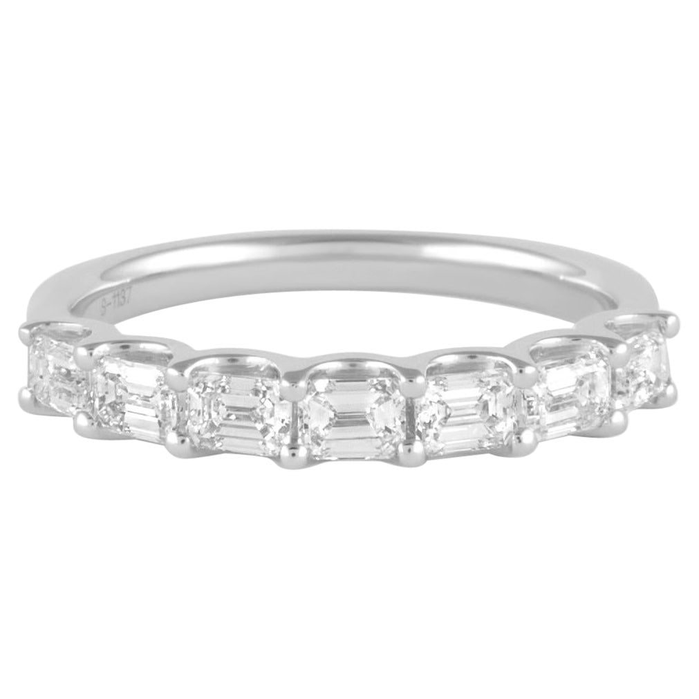 0.92ct Emerald Cut Diamond Eternity Band 18k White Gold: 0.92ct Emerald Cut Diamond Eternity Band 18k White Gold This stunning emerald cut diamond eternity band features seven exquisite emerald cut diamonds totaling 0.92 carats. Each diamond boasts a D-F co