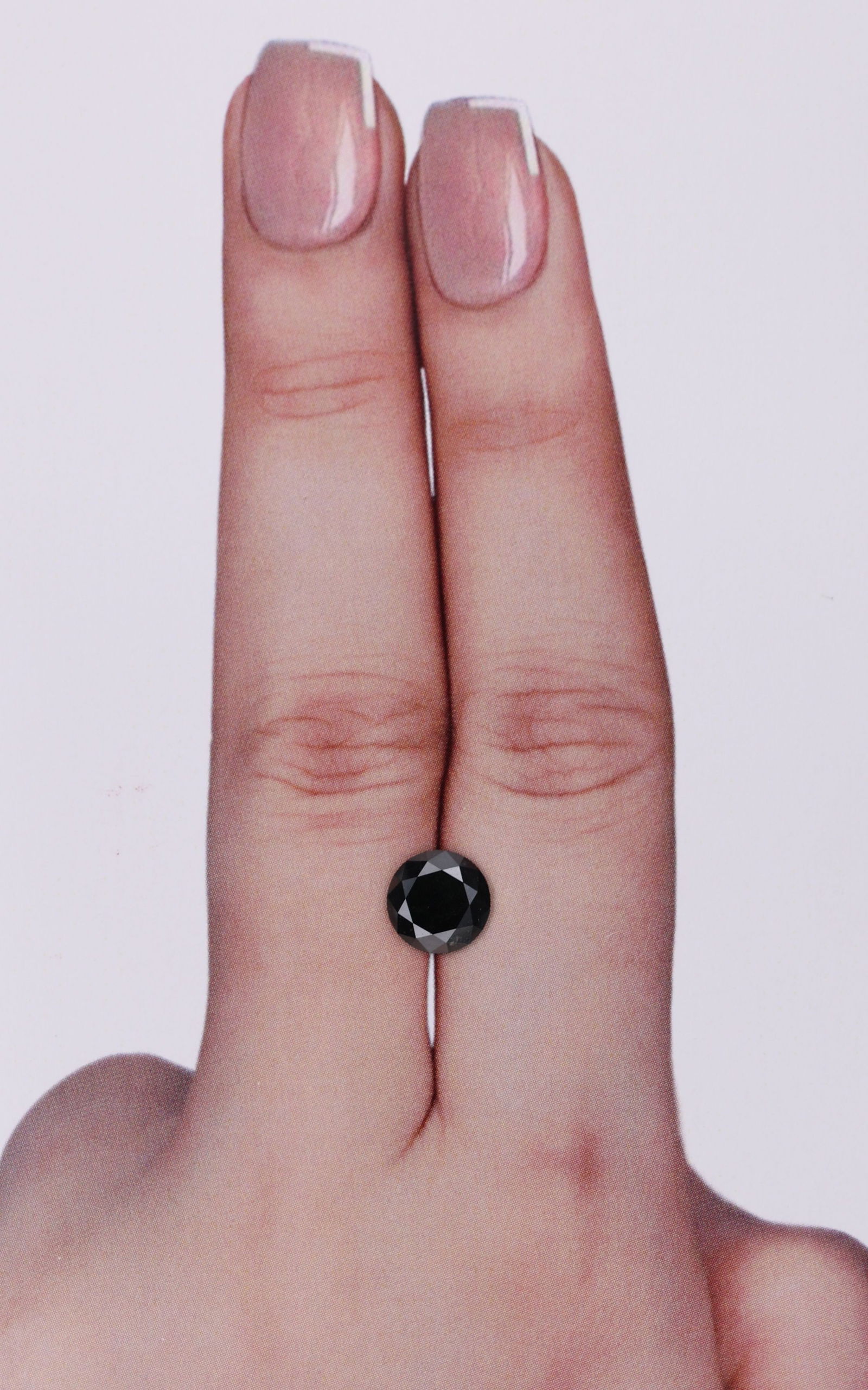 Loose Diamond - ROUND 1.32ct Black: Loose Diamond - ROUND 1.32ct Black Source: Natural Shape: ROUND Carats: 1.32 Color: Black Certification: IGI Video: