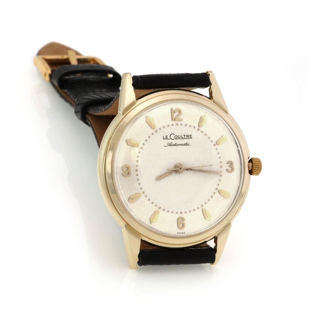 Vintage Le Coultre 14k Yellow Gold Automatic Men's Watch with Leather Band: Vintage Le Coultre 14k Yellow Gold Automatic Men's Watch with Leather Band This exquisite vintage Le Coultre wrist watch showcases timeless elegance, designed specifically for men. The watch features
