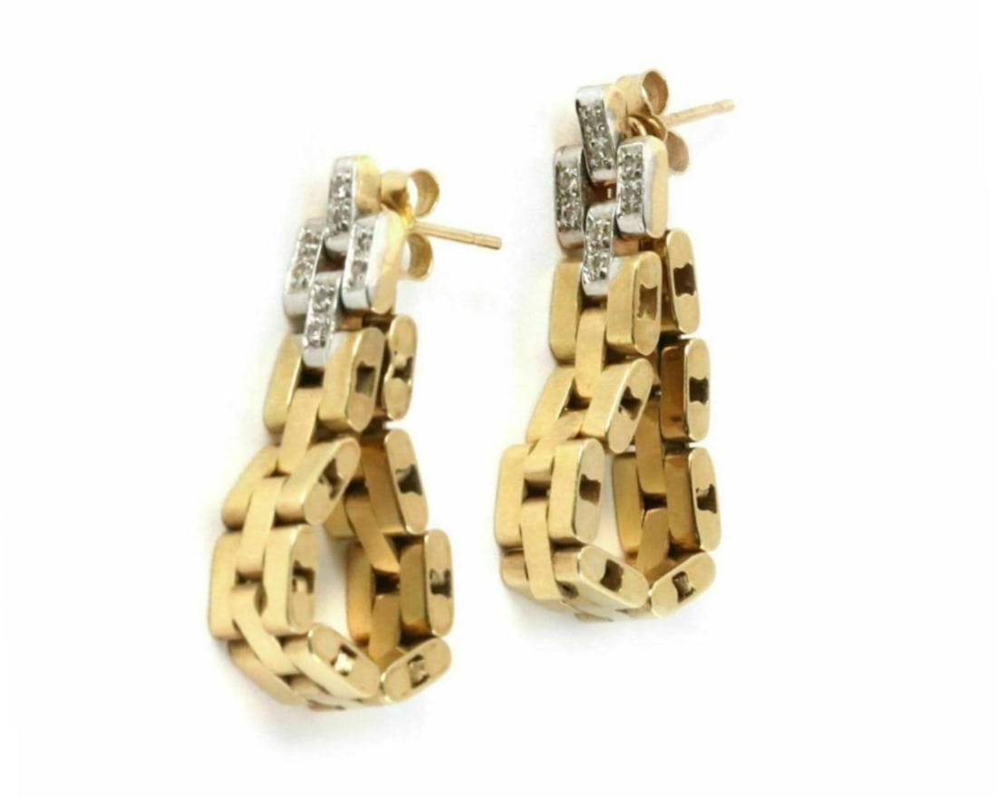 Long Dangle Earrings in 14k Gold with Diamond Link Design: Long Dangle Earrings in 14k Gold with Diamond Link Design These diamond 14k gold link long dangle chain earrings feature an intricate link design in both yellow and white 14k gold. Adorned with real d