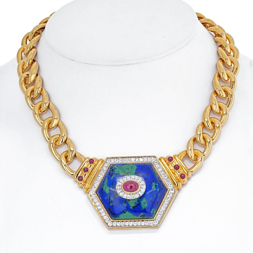 David Webb 18K Gold Hexagonal Azurmalachite Necklace with Diamonds and Rubies: David Webb 18K Gold Hexagonal Azurmalachite Necklace with Diamonds and Rubies This exquisite necklace features a stunning combination of 18K yellow gold and azurmalachite. The centerpiece is a hexagon