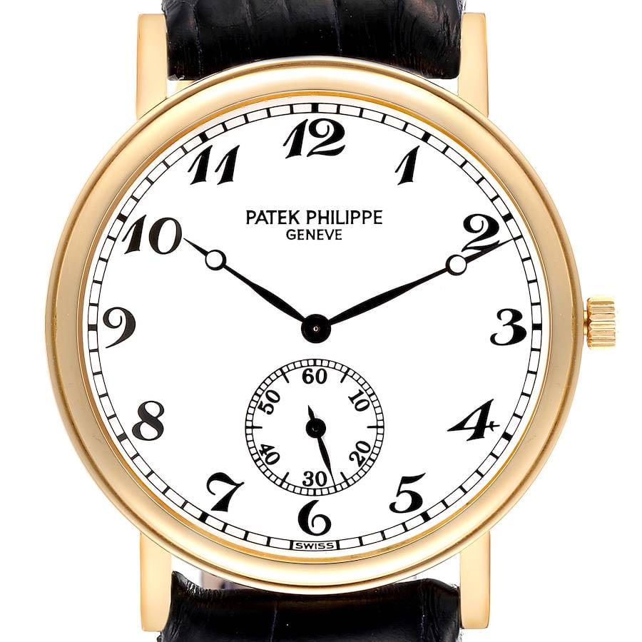 Patek Philippe 5022J-013 Calatrava Officer White Dial Leather Strap with Papers: Patek Philippe 5022J-013 Calatrava Officer White Dial Leather Strap with Papers This Patek Philippe Calatrava Officer B&P Ref 5022J-013 features a classic white Arabic numeral dial and is presented on