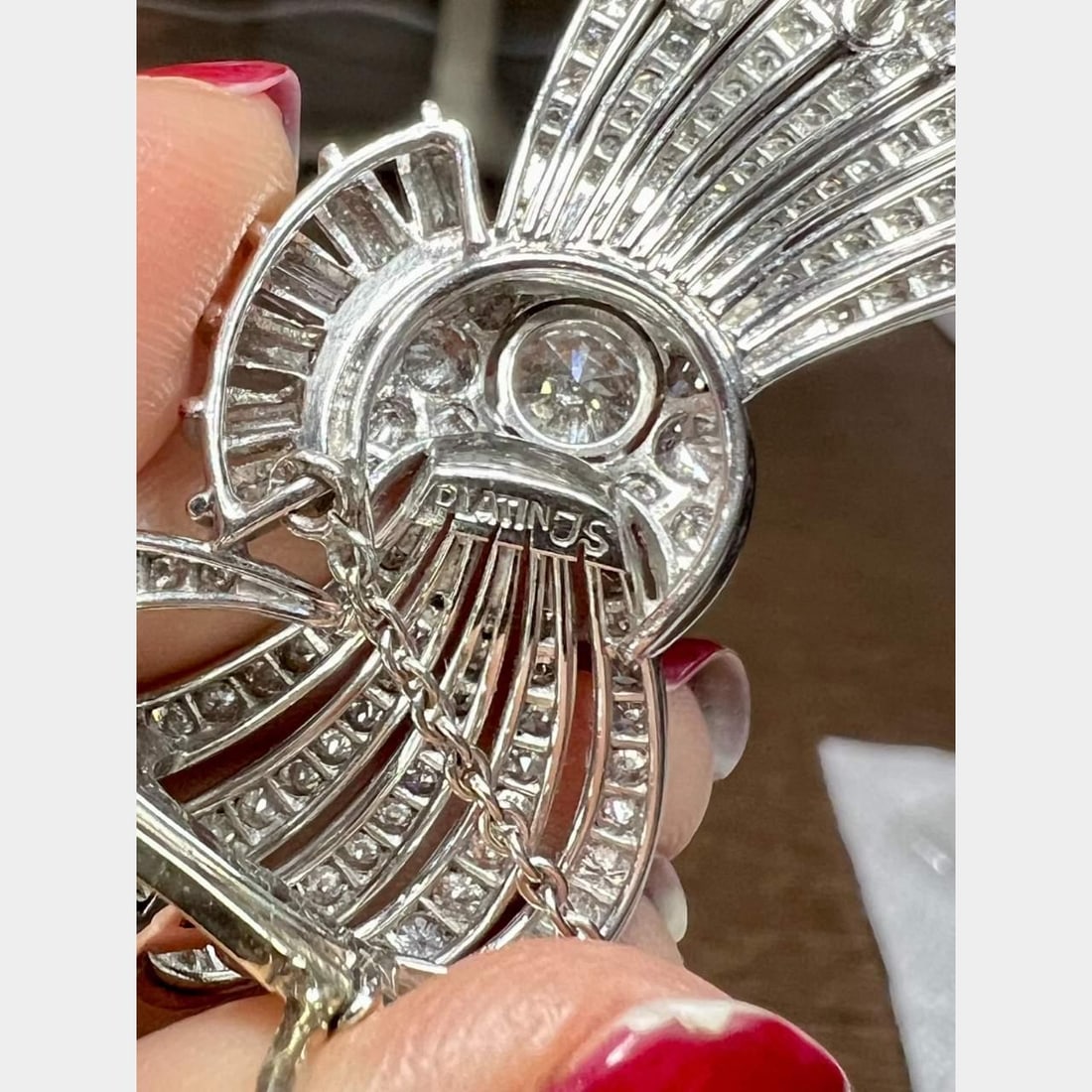 Art Deco Platinum Brooch 4.75 Ct Diamonds E-G VVS-VS 2.25 in: Art Deco Platinum Brooch 4.75 Ct Diamonds E-G VVS-VS 2.25 in This exquisite Art Deco brooch is crafted in platinum and features a stunning array of diamonds totaling approximately 4.75 carats. The bro