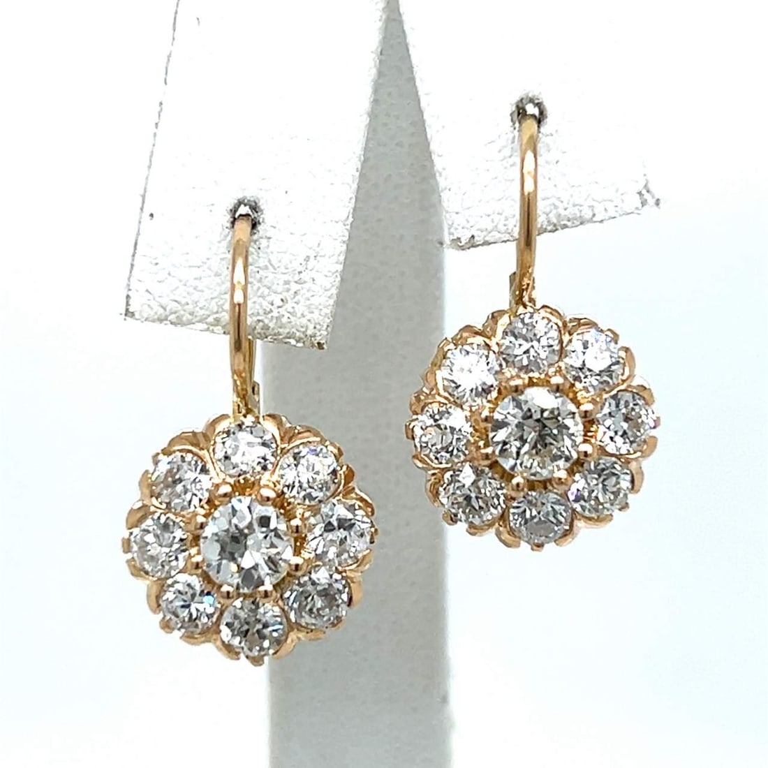 Elegant 18K Yellow Gold 3.35 Ct Old Mine Diamond Earrings: Elegant 18K Yellow Gold 3.35 Ct Old Mine Diamond Earrings Elevate your elegance with these stunning 18K Yellow Gold diamond earrings, featuring a total diamond weight of 3.35 carats. The earrings are