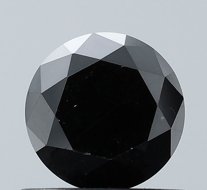 Loose Diamond - ROUND 0.95ct Fancy Black VVS2: Loose Diamond - ROUND 0.95ct Fancy Black VVS2 Source: Natural Shape: ROUND Carats: 0.95 Color: Fancy Black Certification: NONE Video: