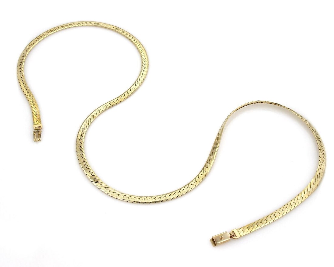 Vintage 14k Yellow Gold Flat Herringbone Necklace 30 Inch Long Wide Design: Vintage 14k Yellow Gold Flat Herringbone Necklace 30 Inch Long Wide Design This vintage herringbone necklace is crafted from 14k yellow gold and features a wide, flat design. Measuring 30 inches in le