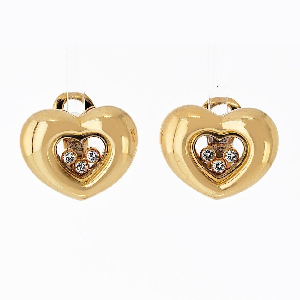 Chopard Happy Diamonds 18K Gold Three Floating Diamond Earrings 0.25cttw: Chopard Happy Diamonds 18K Gold Three Floating Diamond Earrings 0.25cttw Elevate your elegance with these exquisite Chopard Happy Diamonds earrings, crafted in luxurious 18K yellow gold. Featuring thr