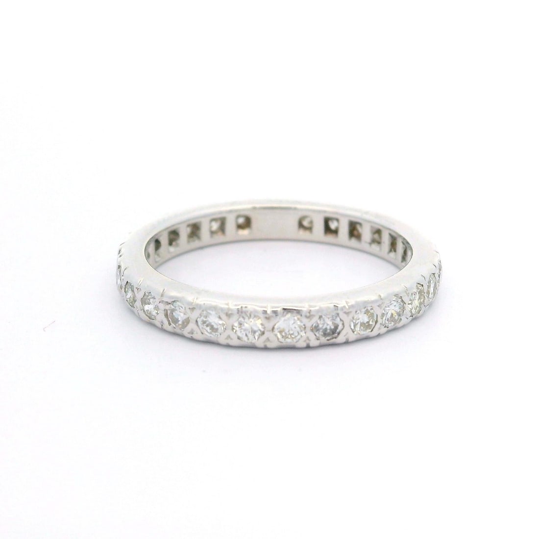 Vintage 14k White Gold 0.60ctw Diamond Eternity Band Ring: Vintage 14k White Gold 0.60ctw Diamond Eternity Band Ring This exquisite vintage eternity band ring, crafted in 14k white gold, features a stunning array of 27 natural genuine round cut diamonds set i