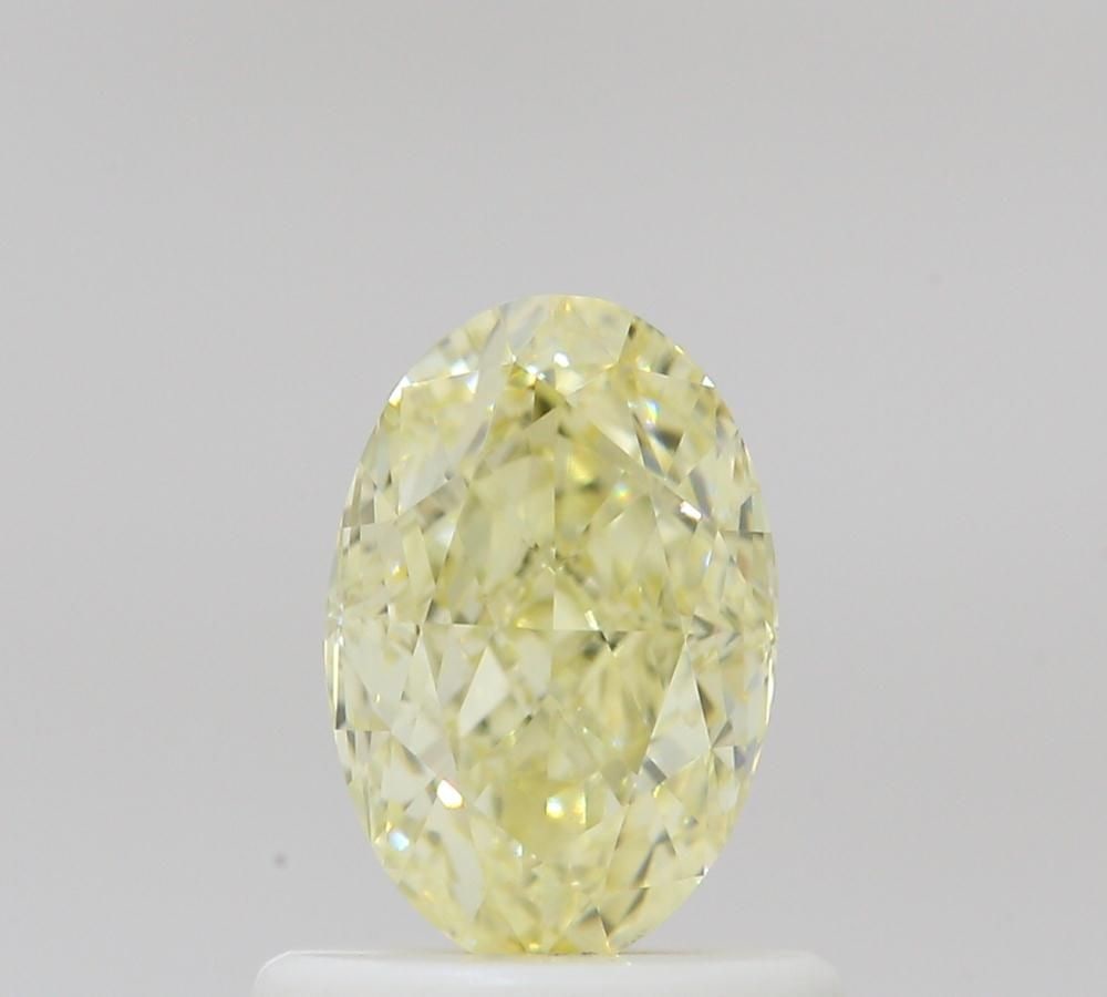 Loose Diamond - OVAL 0.76ct Fancy Light Yellow VS2: Loose Diamond - OVAL 0.76ct Fancy Light Yellow VS2 Source: Natural Shape: OVAL Carats: 0.76 Color: Fancy Light Yellow Certification: GIA Video: