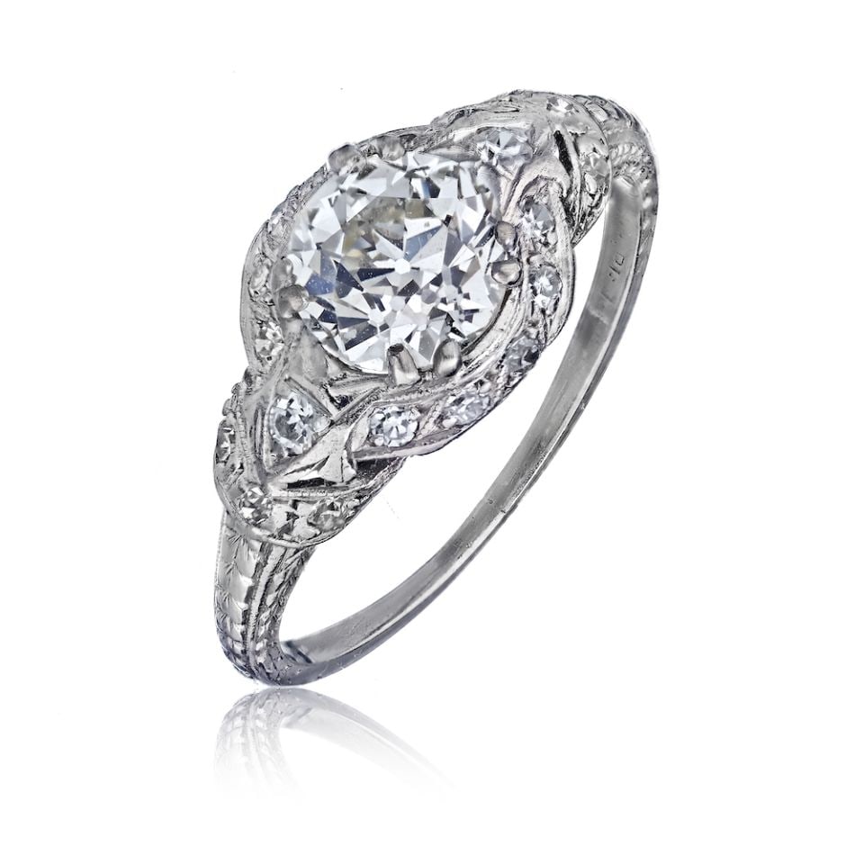 Stunning 1.41ct Old-European Cut Diamond Platinum Vintage Engagement Ring: Stunning 1.41ct Old-European Cut Diamond Platinum Vintage Engagement Ring Discover the timeless elegance of this vintage engagement ring featuring a stunning 1.41 carat Old-European cut diamond. Craft