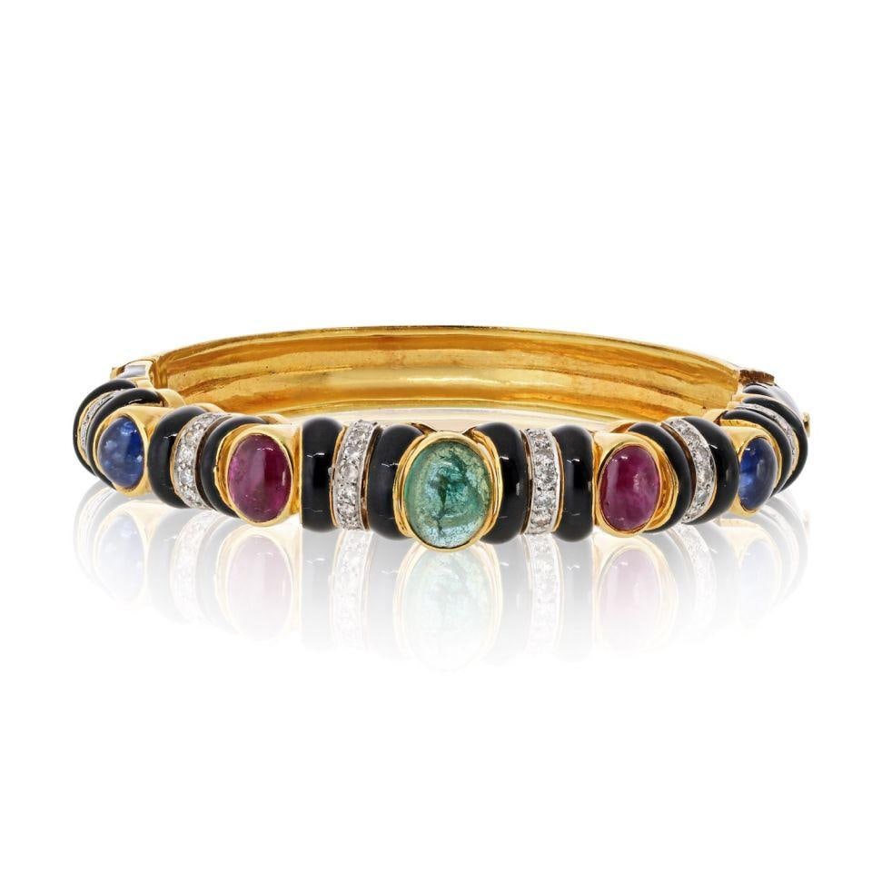 David Webb Vintage 18K Gold Bracelet with Gemstones and Diamonds: David Webb Vintage 18K Gold Bracelet with Gemstones and Diamonds Discover the exquisite craftsmanship of this vintage David Webb bracelet, a statement piece that embodies luxury. Crafted from 18K yell