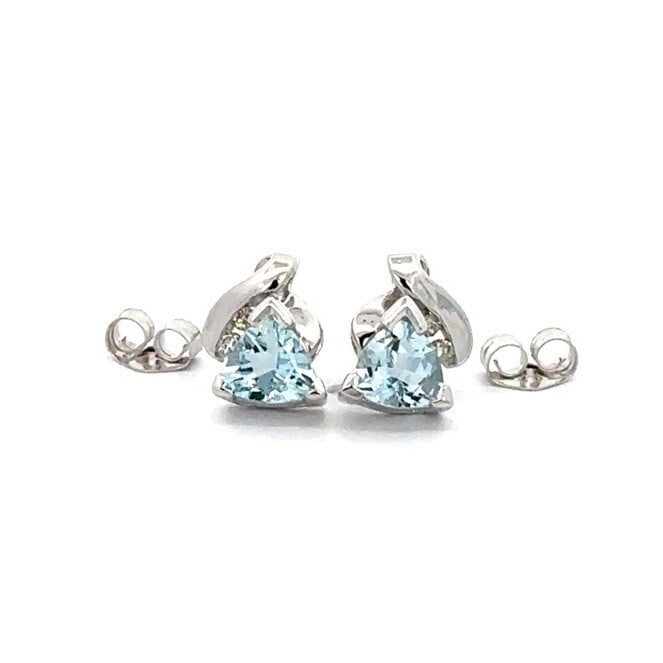 14K White Gold Aquamarine Trillion Cut Stud Earrings with Diamond Accents: 14K White Gold Aquamarine Trillion Cut Stud Earrings with Diamond Accents Adorn your ears with these exquisite 14K White Gold Aquamarine Trillion Cut Stud Earrings, featuring stunning diamond accents.