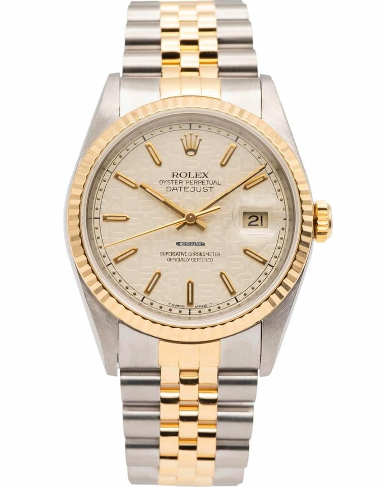 Ivory Anniversary Dial Jubilee Bracelet Rolex 16233 Datejust Watch: Ivory Anniversary Dial Jubilee Bracelet Rolex 16233 Datejust Watch This Rolex Datejust features an ivory Anniversary dial, a fluted bezel, and a Jubilee bracelet. Designed for men, it carries the refe