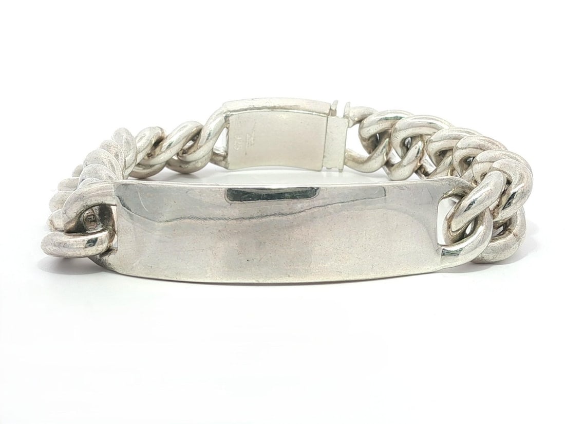 Shinola Sterling Silver Heavy Curb Link ID Bracelet 7 in Push Clasp: Shinola Sterling Silver Heavy Curb Link ID Bracelet 7 in Push Clasp This exquisite Shinola Sterling Silver .925 Heavy Curb Link ID Bracelet is a perfect blend of style and elegance. Crafted from premi