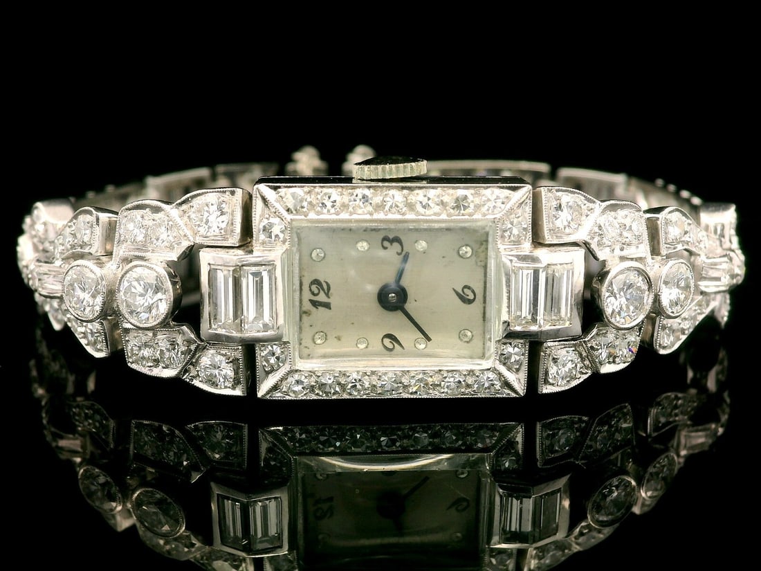 Antique Platinum 3.72ctw Diamond Wrist Watch Bracelet 1920s: Antique Platinum 3.72ctw Diamond Wrist Watch Bracelet 1920s This exquisite antique wristwatch is a remarkable blend of elegance and craftsmanship, featuring a stunning combination of old round and bag