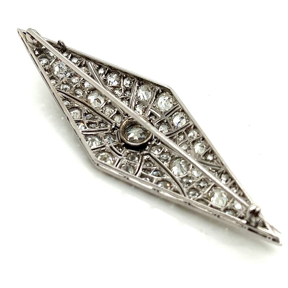Art Deco Platinum Brooch 11.75 Ct Diamonds 3 Inches: Art Deco Platinum Brooch 11.75 Ct Diamonds 3 Inches This exquisite Art Deco brooch is crafted from platinum and showcases a stunning 11.75 carats of diamonds. The centerpiece features approximately a