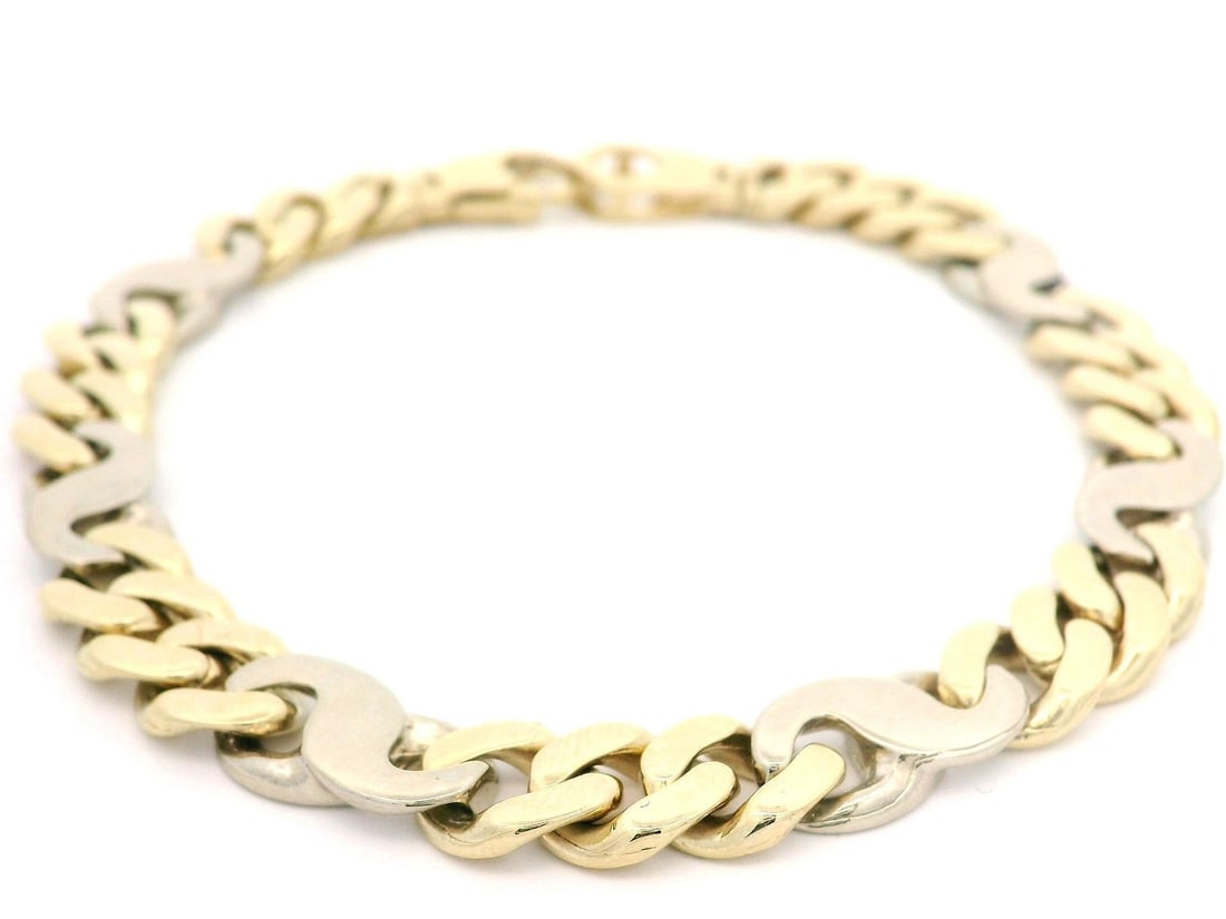 Men's 14k Yellow Gold Cuban Link Bracelet with White Gold Infinity Link: Men's 14k Yellow Gold Cuban Link Bracelet with White Gold Infinity Link This exquisite Men's bracelet combines the luxurious appeal of 14k yellow gold with elegant white gold accents in a Cuban link d