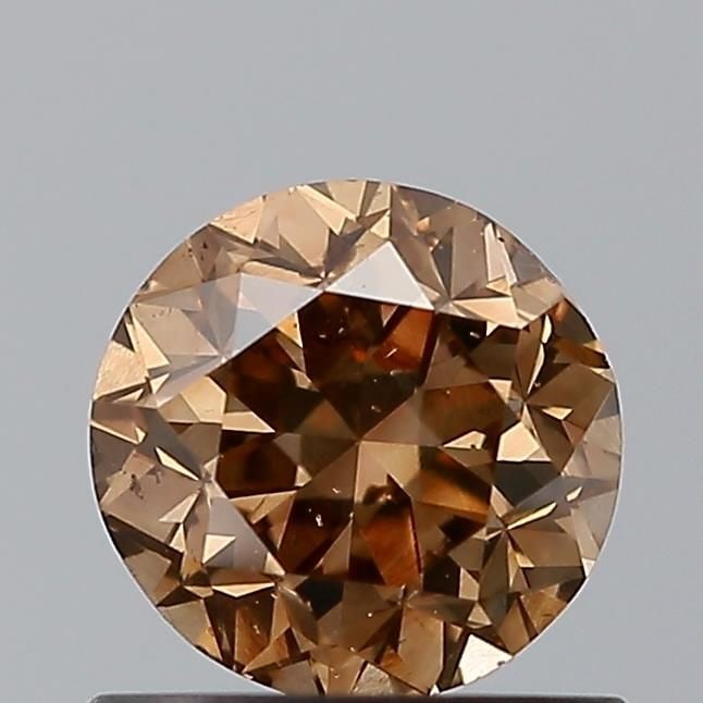 Loose Diamond - ROUND 0.7ct Brown SI1: Loose Diamond - ROUND 0.7ct Brown SI1 Source: Natural Shape: ROUND Carats: 0.7 Color: Brown Certification: NONE Video: