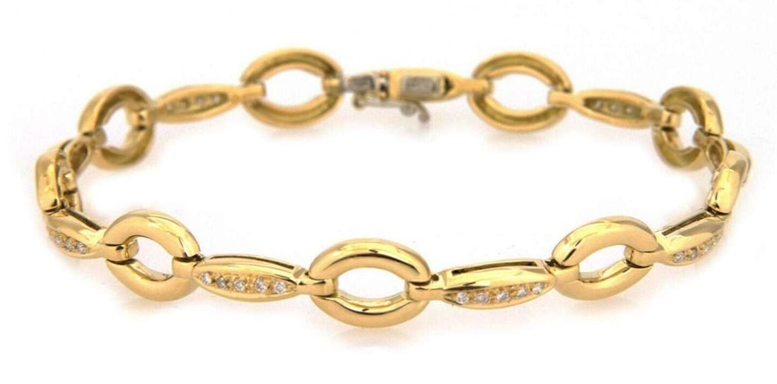 18k Yellow Gold Keren Bar Link Bracelet With Diamonds by Aaron Basha: 18k Yellow Gold Keren Bar Link Bracelet With Diamonds by Aaron Basha This Aaron Basha "Keren" bracelet features an elegant oval bar link design, crafted in solid 18k yellow gold. Adorned with approxim