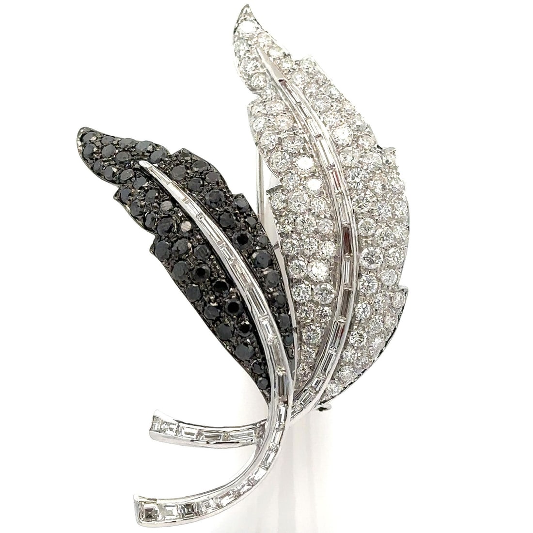 18k White Gold 10.50ctw Black and White Diamond Dual Feather Brooch: 18k White Gold 10.50ctw Black and White Diamond Dual Feather Brooch This exquisite dual feather leaf pin brooch is crafted from solid 18k white gold and showcases a stunning array of black and white d