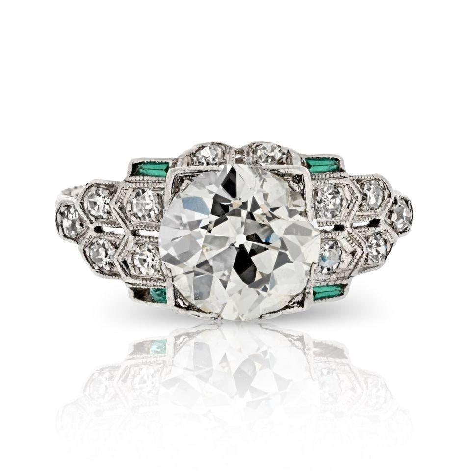 2.13 Carat GIA Certified Old European Cut Diamond Platinum Engagement Ring: 2.13 Carat GIA Certified Old European Cut Diamond Platinum Engagement Ring This exquisite vintage engagement ring showcases a stunning 2.13 carat Old European cut diamond, certified by GIA, featuring