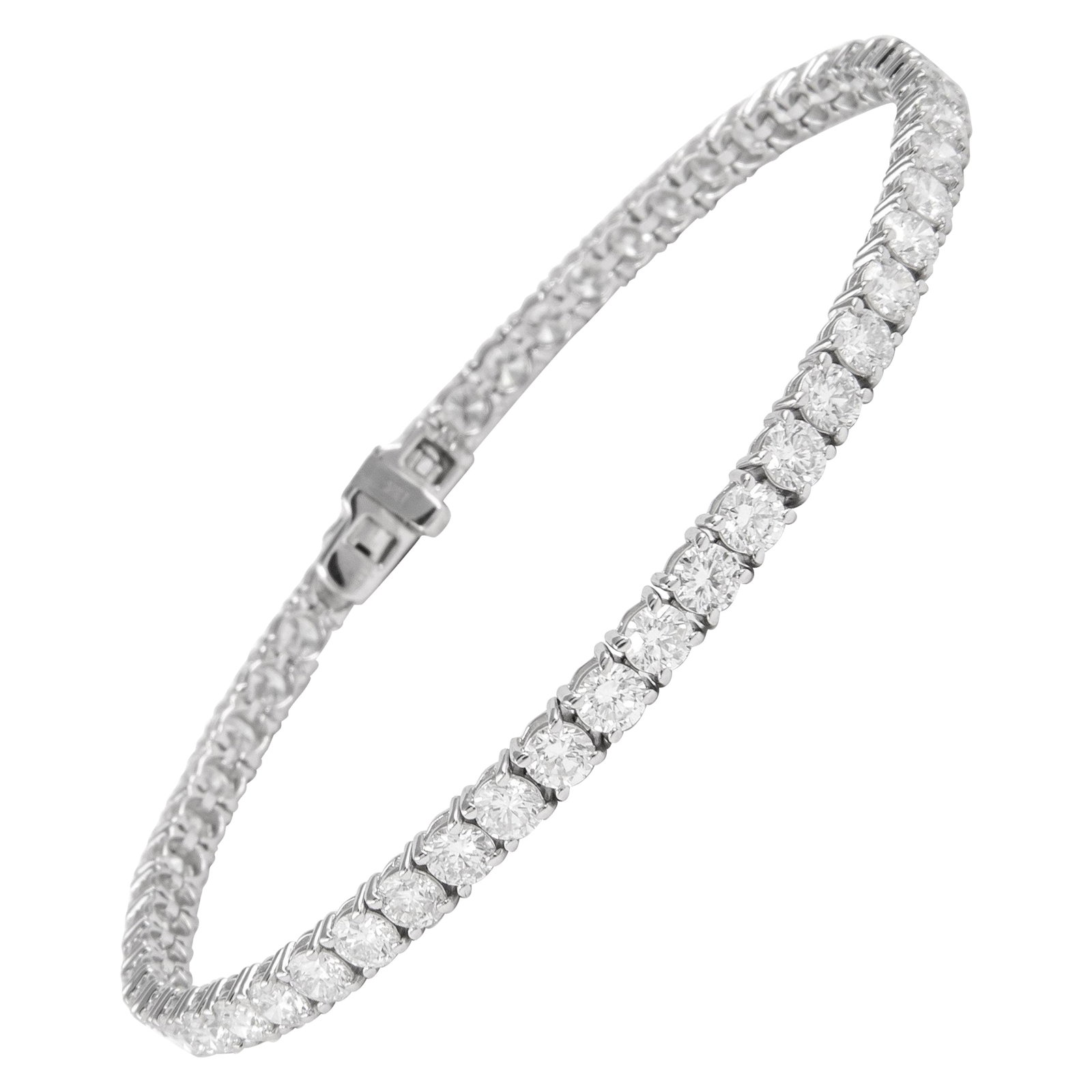 5.98ct Diamond Tennis Bracelet 18k White Gold: 5.98ct Diamond Tennis Bracelet 18k White Gold This exquisite 5.98ct Diamond Tennis Bracelet is crafted in 18k white gold, featuring 53 round brilliant diamonds with a total weight of 5.98 carats. The