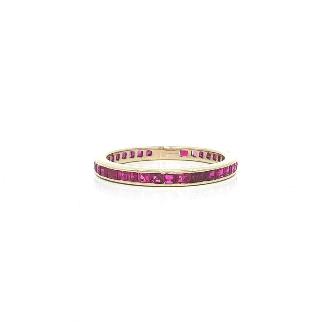Solid 13-14k Yellow Gold Band With Channel Set Square Lab Grown Rubies: Solid 13-14k Yellow Gold Band With Channel Set Square Lab Grown Rubies This vintage stackable band ring features square step cut lab grown rubies in a channel setting, crafted in solid 13-14k yellow g