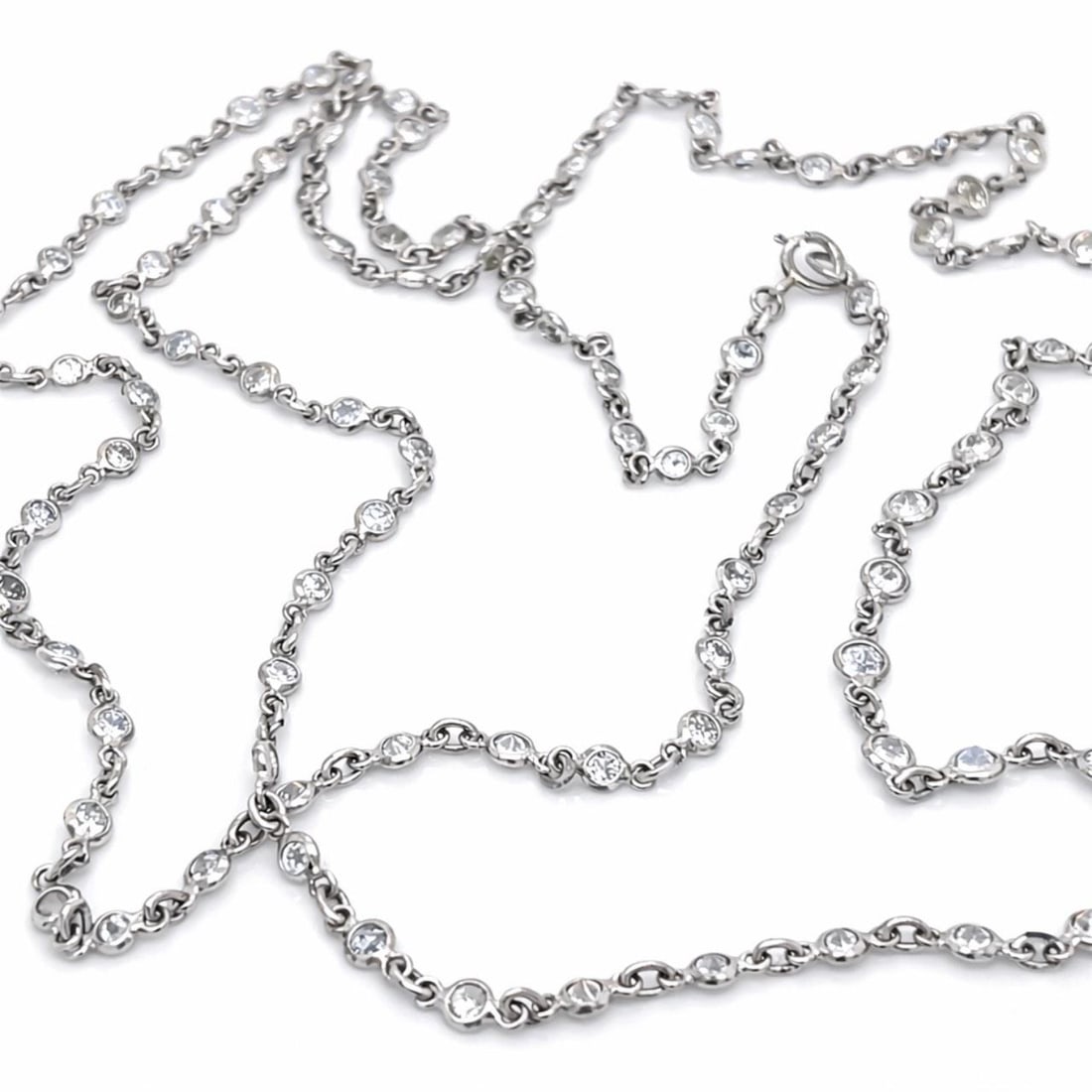 29 Inch Platinum Necklace With 7.00 Ct Diamonds By The Yard: 29 Inch Platinum Necklace With 7.00 Ct Diamonds By The Yard This Platinum Diamond by the Yard necklace features approximately 7.00 carats of 100 diamonds with G-I color and VS1-I1 clarity. The necklac