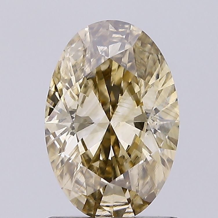 Loose Diamond - OVAL 0.77ct Fancy Brown VS1: Loose Diamond - OVAL 0.77ct Fancy Brown VS1 Source: Natural Shape: OVAL Carats: 0.77 Color: Fancy Brown Certification: NONE Video: