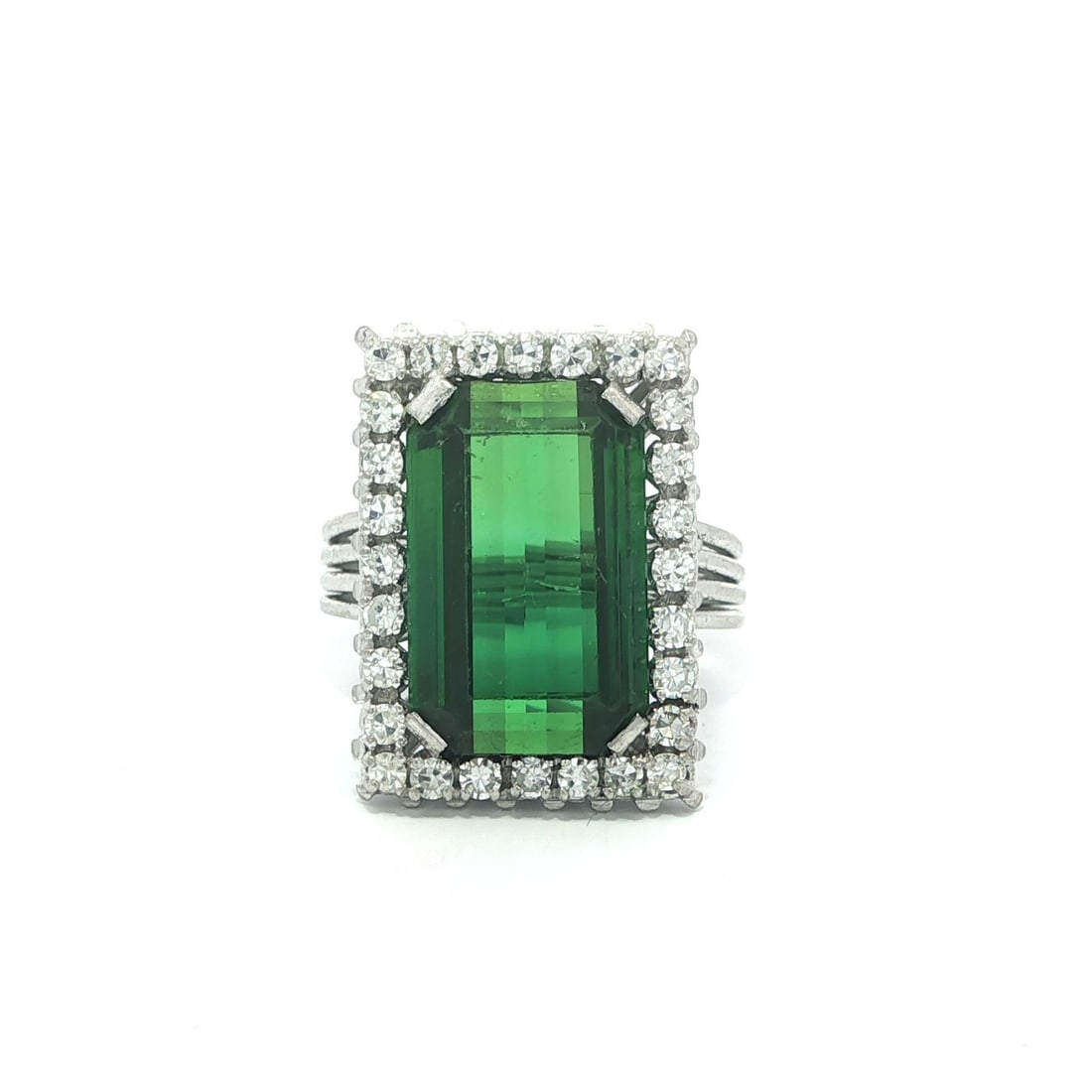 Handcrafted Platinum Cocktail Ring With 10ct Green Tourmaline And Old Cut Diamonds: Handcrafted Platinum Cocktail Ring With 10ct Green Tourmaline And Old Cut Diamonds This vintage handmade cocktail ring features a striking long emerald-cut natural green tourmaline, framed by old sing