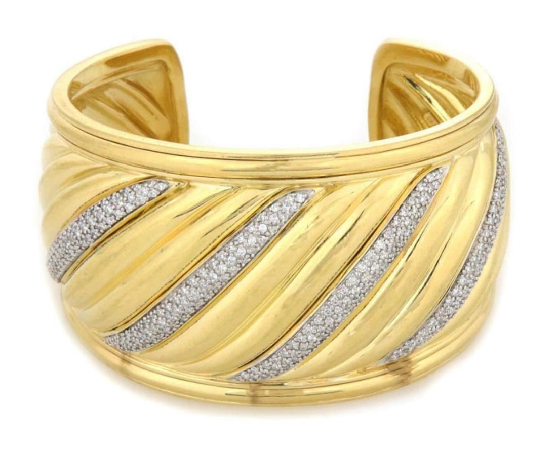 Sculpted Cable Diamond Cuff Bracelet in 18k Yellow and White Gold by David Yurman: Sculpted Cable Diamond Cuff Bracelet in 18k Yellow and White Gold by David Yurman This David Yurman wide cuff bracelet from the Sculpted Cable Collection is crafted from solid 18k yellow gold and feat