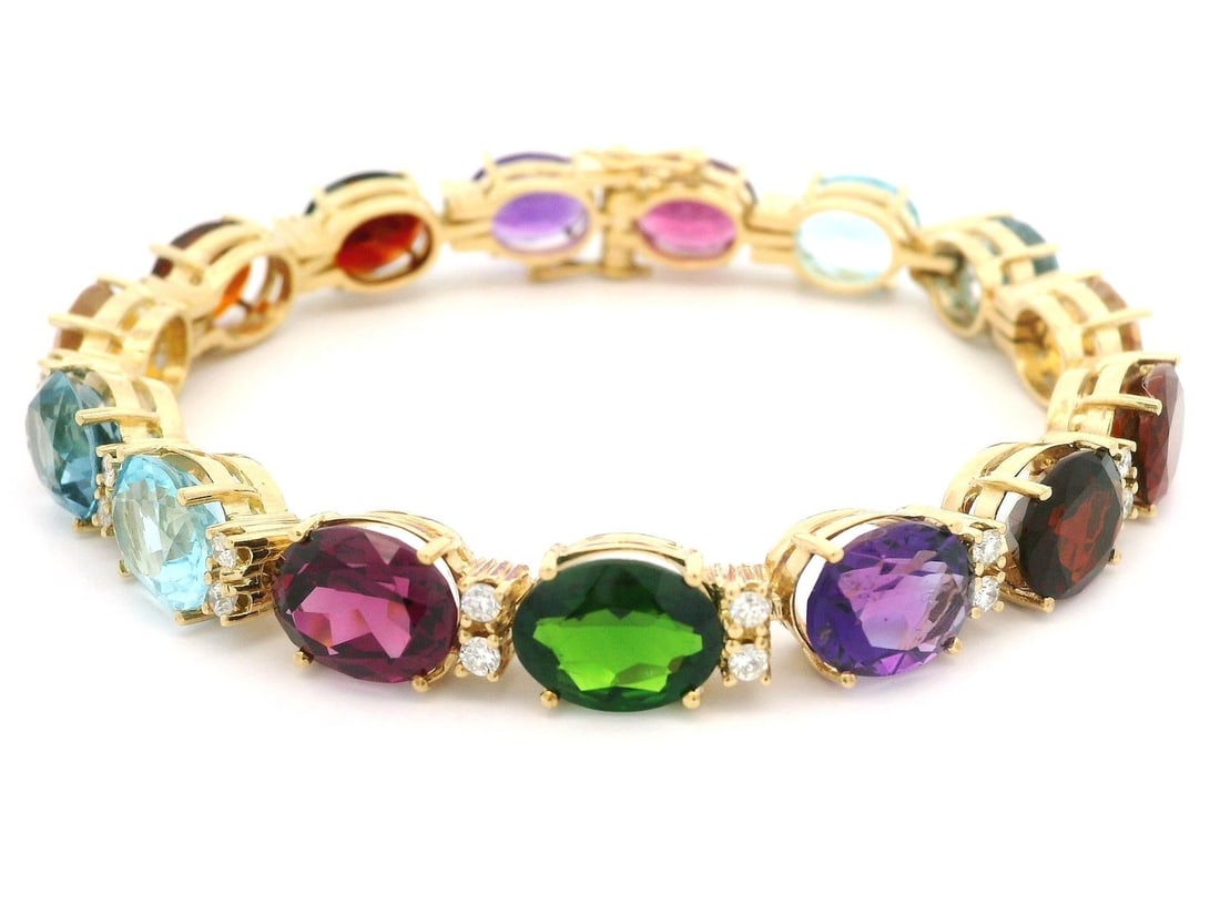 18k Yellow Gold Link Bracelet with Diamonds and Colorful Stones: 18k Yellow Gold Link Bracelet with Diamonds and Colorful Stones This stunning 18k yellow gold link bracelet showcases an exquisite combination of diamonds and vivid genuine colored stones. Featuring 3