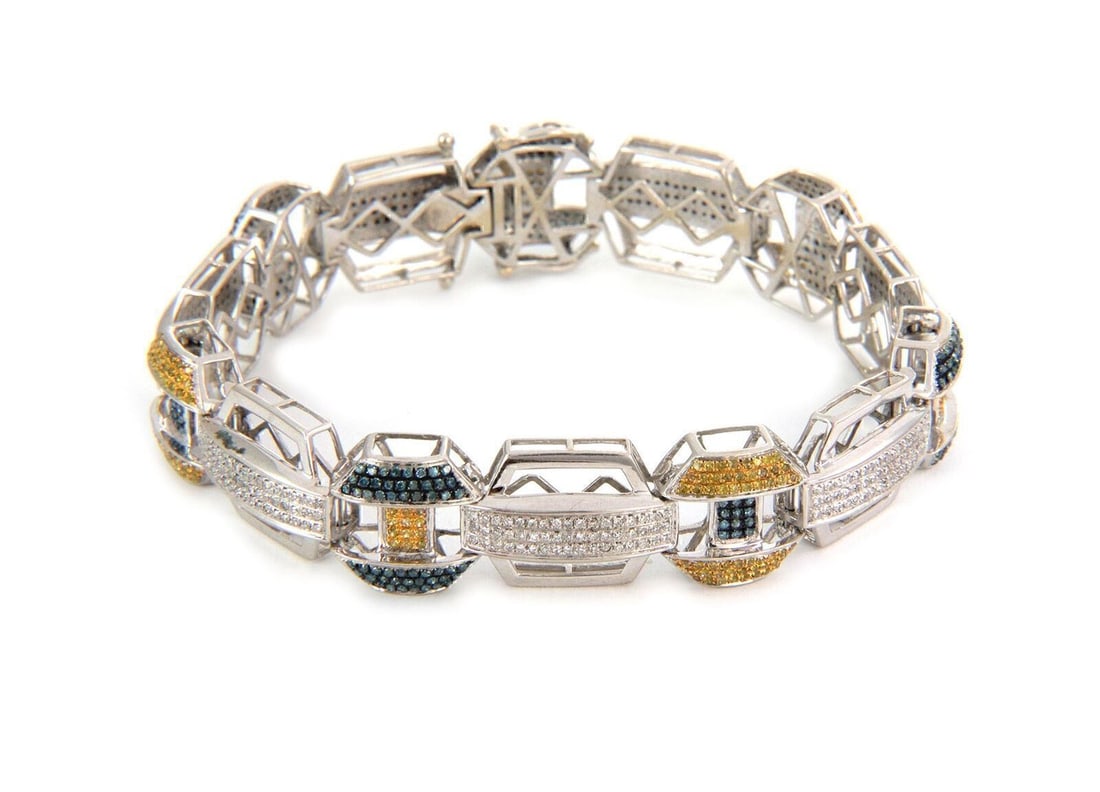 Vintage 14k White Gold Octagonal Link Bracelet with Multicolor Diamonds: Vintage 14k White Gold Octagonal Link Bracelet with Multicolor Diamonds This vintage octagon fancy link bracelet is crafted from solid 14k white gold and features a striking pattern set with multi-col