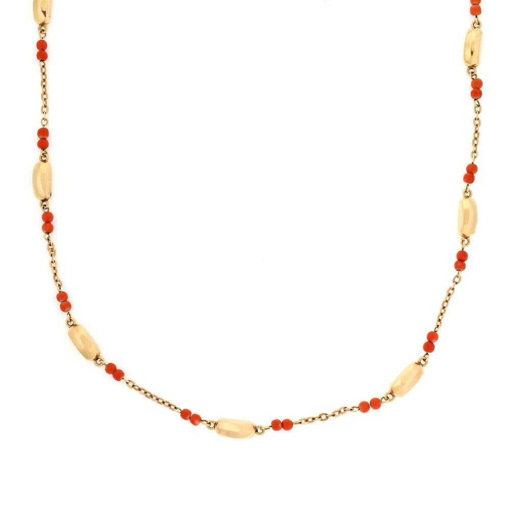 Vintage 18k Yellow Gold Coral Bead Necklace 32 Inch Long: Vintage 18k Yellow Gold Coral Bead Necklace 32 Inch Long Discover the elegance of this vintage necklace, masterfully crafted from luxurious 18k yellow gold. The design features alternating curved bar
