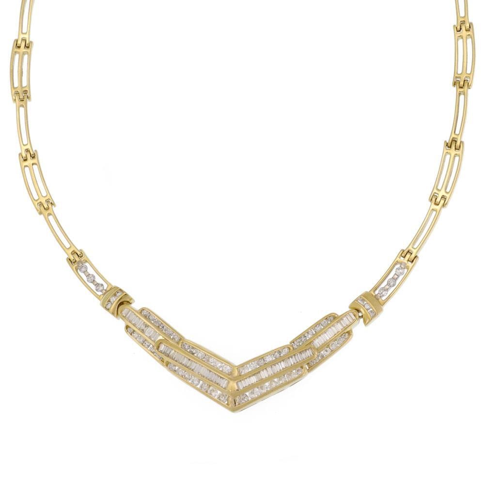 Elegant 7ct Diamond V Pendant Necklace in 18k Yellow Gold: Elegant 7ct Diamond V Pendant Necklace in 18k Yellow Gold This exquisite collar necklace is crafted from 18k yellow gold, showcasing a polished finish. The centerpiece features a striking V shape divi