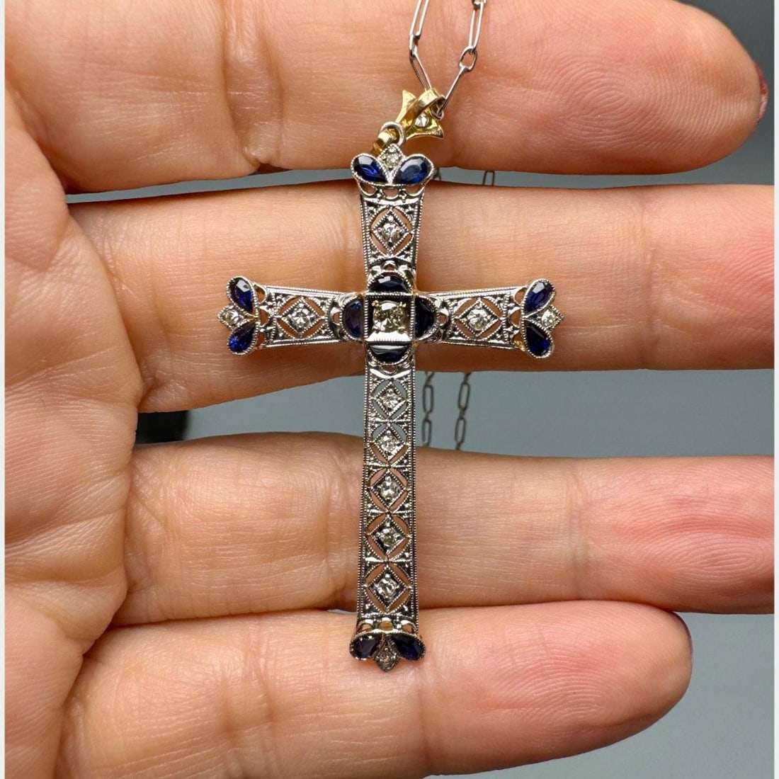 16 Inch Chain with Antique 18K Gold and Platinum Cross Pendant: 16 Inch Chain with Antique 18K Gold and Platinum Cross Pendant This antique cross pendant features a combination of 18K gold and platinum, paired with a matching chain. The pendant measures 2 inches i