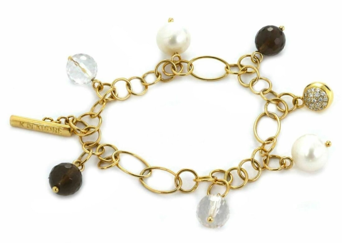 18k Yellow Gold K Di Kuore Bracelet With Diamonds Pearls Quartz Charms: 18k Yellow Gold K Di Kuore Bracelet With Diamonds Pearls Quartz Charms This original K Di Kuore charm link bracelet is crafted from 18k yellow gold and features natural diamonds, clear and smoky quart