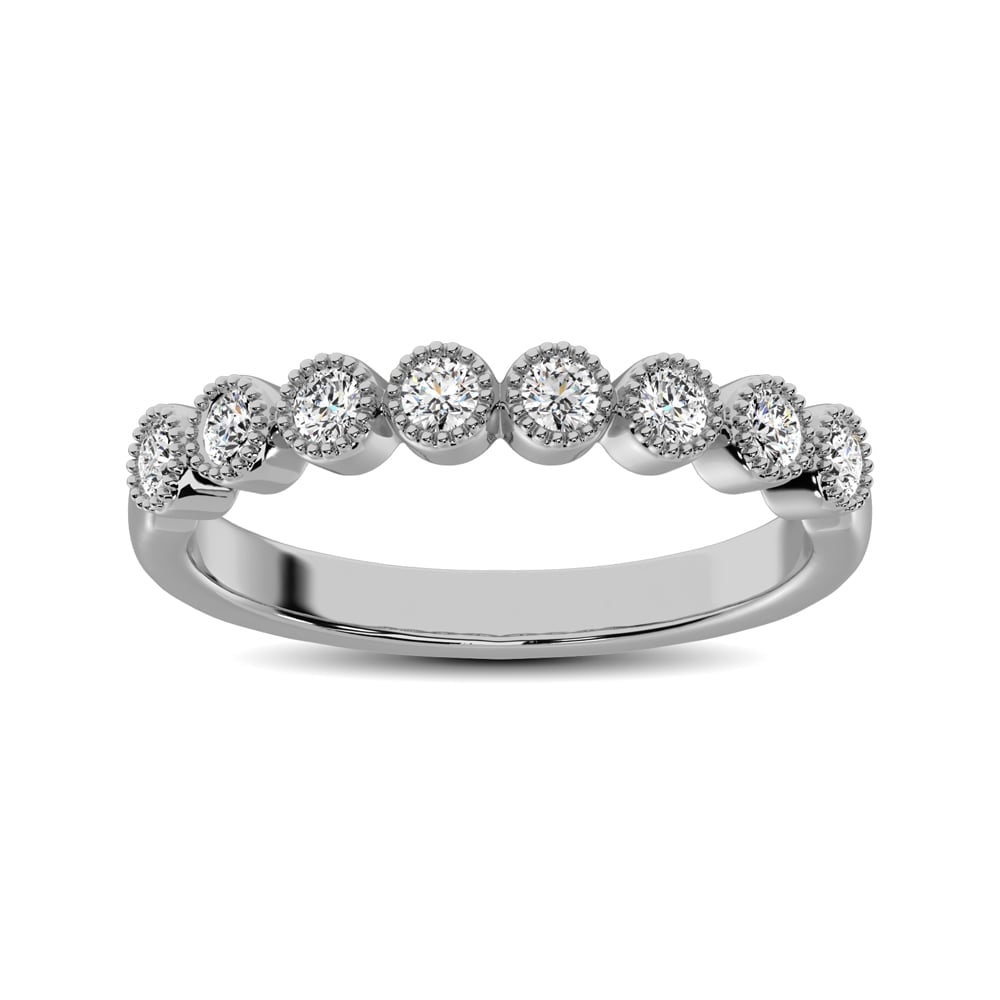 Diamond 1/4 Ct.tw Stackable Bezel Band with Beaded Setting in 14K White Gold: Diamond 1/4 Ct.tw Stackable Bezel Band with Beaded Setting in 14K White Gold Add shimmer and shine to your stack with this sparkling vintage-inspired diamond ring. Crafted in warm 14K gold, this dazzl