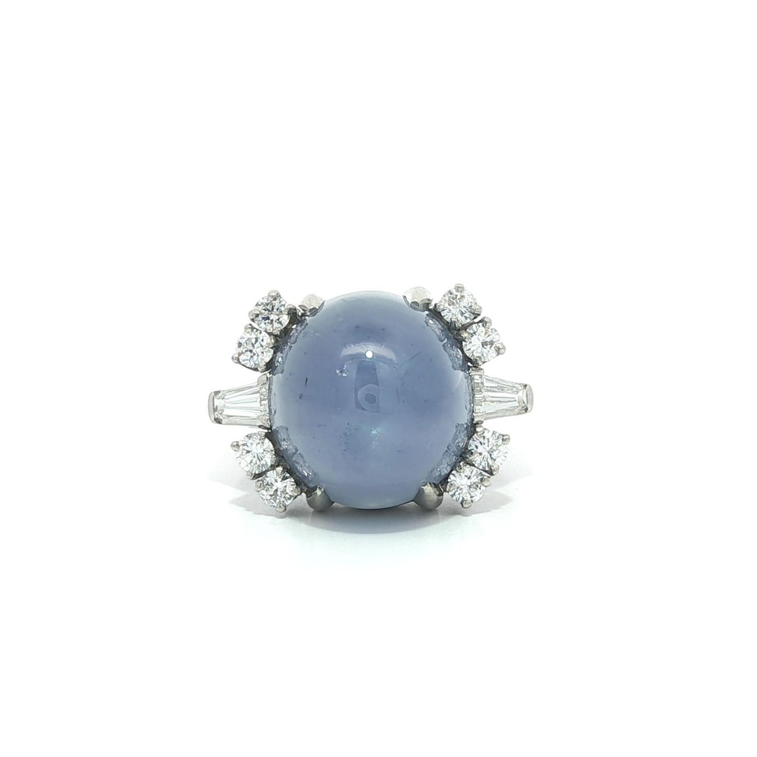 Vintage GIA Certified 15.97ct Blue Star Sapphire Diamond Ring in Platinum: Vintage GIA Certified 15.97ct Blue Star Sapphire Diamond Ring in Platinum Discover a stunning vintage ring featuring a natural genuine star sapphire, showcasing an oval cabochon cut with a striking bl
