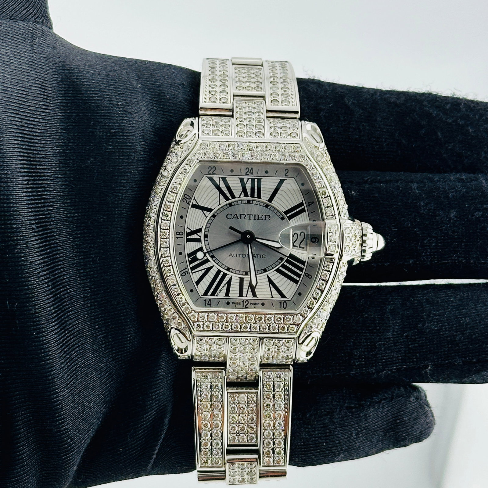 Diamond Bezel Cartier Roadster Ref 2722 Men's Watch with Silver Roman Dial: Diamond Bezel Cartier Roadster Ref 2722 Men's Watch with Silver Roman Dial This Cartier Roadster watch features a silver Roman dial complemented by a diamond-set bezel and diamond bracelet. Designed f